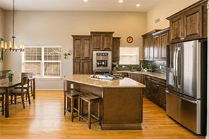 Sollid Cambria Saddle Cabinets & Santa Cecilia Gold Granite